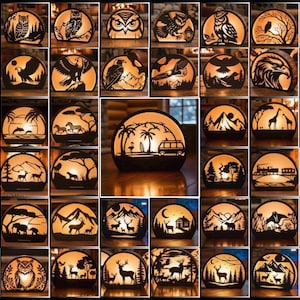 May include: A collection of decorative lamps with various nature-themed cut-out designs. The lamps feature silhouettes of owls, eagles, bears, deer, giraffes, and landscapes, illuminated with a warm, inviting glow. The lamps are ideal for home decor.