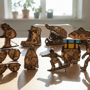 May include: Wooden laser-cut figurines of outdoor adventure themes, including a skier, snowboarder, backpack, fish, Bigfoot, and a motorcycle helmet. Also included are two pairs of sunglasses with mountain scenes.