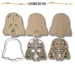 May include: A layered cut file for a Darth Vader mask with a Day of the Dead design. The file includes five layers: a solid outline, a detailed design, a solid mask, a solid outline, and a blank mask.