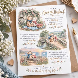 May include: A white greeting card titled To My Amazing Husband featuring three illustrations of two teddy bears in various settings, including a picnic, a stone bridge, and a seaside bench, with printed text and small heart accents.