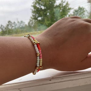 This is a SET. Sunset. Brand new,yellow pink orange. White brand new,white blue cream.