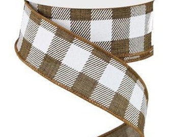 May include: A roll of decorative ribbon featuring a brown and white checkered pattern. The ribbon is made of a textured material and has a brown edge. The ribbon is ideal for crafts, gift wrapping, and seasonal decorations.