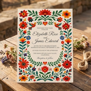 May include: A wedding invitation with a colourful floral border. The invitation features the names "Elizabeth Rose and James Edward" and event details. The design includes birds and hearts. The text reads "Reception to follow".