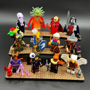 May include: A three-tiered display stand with 12 miniature figurines. The figurines are made of plastic and are painted in various colors. The figurines depict characters from a fantasy role-playing game. The stand is made of wood and has a brown finish.