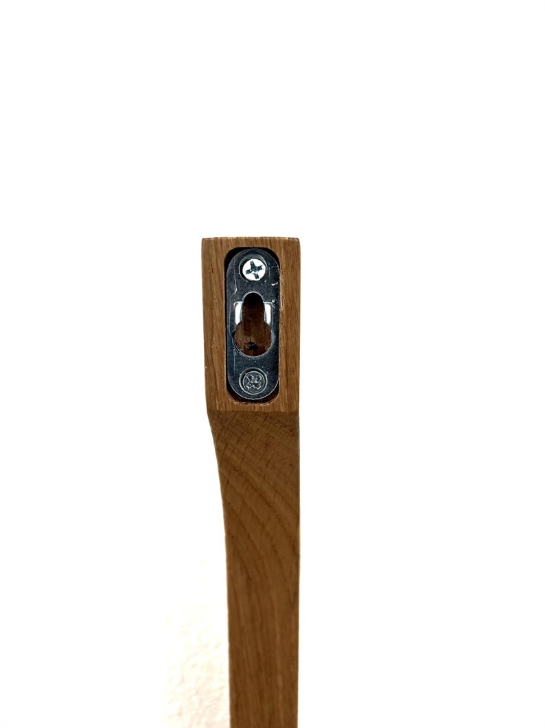 This Viking Longship (langskib) inspired wine rack brings the essence of a journey into your home or office. Each bottle angled downward, wine stays in contact with the cork. 8 ports wine bottles which allow opposing storage of four bottles per side.