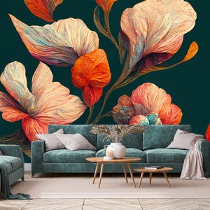 May include: A teal sofa and armchair set with throw pillows and a blanket, set against a dark teal floral wallpaper. The wallpaper features large, stylized flowers in shades of orange, peach, and cream.