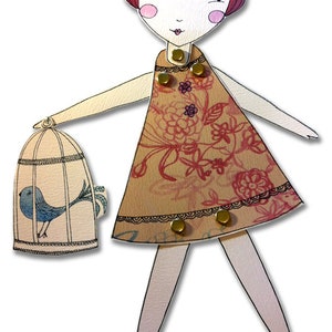 May include: A paper doll with red hair, a floral dress, and a bird in a cage. The doll has a white face with pink cheeks and a red mouth. The dress is brown with pink flowers and a gold trim. The bird is blue with a white belly.
