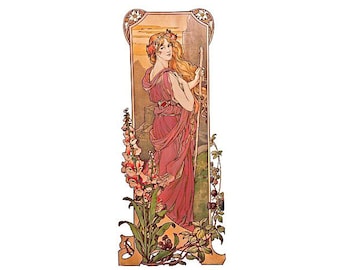 May include: Art Nouveau style print featuring a woman in a flowing red dress, holding a staff, and adorned with flowers in her hair. The artwork is framed with floral and geometric designs, with a soft, warm color palette.