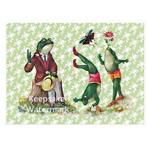 May include: Three green frogs, one wearing a suit and hat, another wearing red shorts and doing a handstand, and the third wearing yellow shorts and holding a flower. The background is a green pattern of frogs.