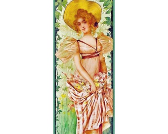 May include: A woman in a yellow straw hat and a pink and white striped dress holds a bouquet of flowers. She is standing in a green leafy setting.