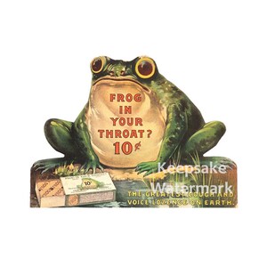 May include: A vintage advertisement for Frog in Your Throat lozenges featuring a cartoon frog with large eyes and the text "Frog in Your Throat? 10¢". The frog is sitting on a green lily pad with a box of lozenges in the foreground.