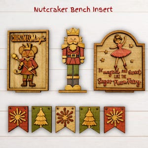 May include: Wooden Christmas-themed bench inserts. Includes a mouse in a red coat with the text "Christmas Magic", a nutcracker, a ballerina with the text "Be magical and sweet like the Sugar Plum Fairy", and festive banners.