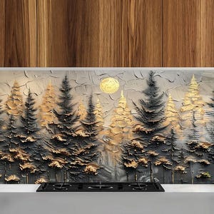 May include: A kitchen backsplash featuring a painted design of a forest scene with gold and black trees. The trees are silhouetted against a light grey background with a gold moon in the sky.