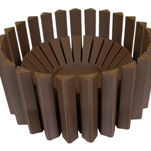 May include: A brown, cylindrical, decorative planter made of multiple vertical slats. The planter has a circular opening at the top and a slightly wider base.