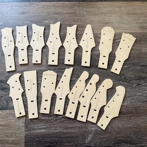 set of 16 3 string cigar box guitar headstocks