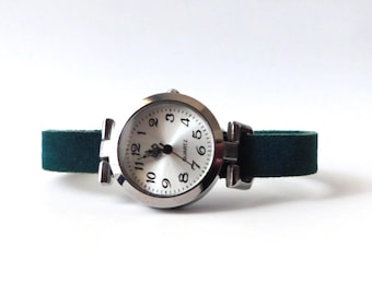 Women's wristwatch. Simple design with a custom-size suede band and magnetic clasp.