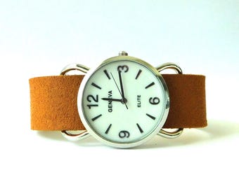 Wristwatch, large, round, silver finish, camel suede band.