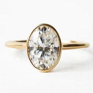 2CT Oval Cut Moissanite Engagement Ring, Bezel Set Solitaire in Yellow Gold, Perfect Promise Anniversary Gift for Women.