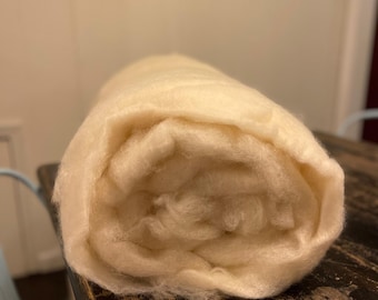 Silky wool batting, pillow & comforter stuffing, craft supply.  Sold by the yard