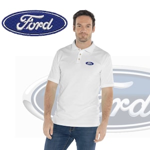 May include: A white polo shirt with a blue oval embroidered patch that says "Ford" on it.