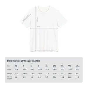 May include: A white Bella+Canvas 3001 t-shirt with measurements indicated by arrows. The size chart shows width from 41.9 to 81.3 cm, length from 68.6 to 88.9 cm, and sleeve length from 21.8 to 28.4 cm.