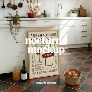 May include: A framed poster with the text "FRESH & ORGANIC nocturne mockup" in a red, white and black colour scheme. The poster features a stylised illustration of a wine glass with the words "FULL BODIED & CRISP" and "LOCAL" on it.