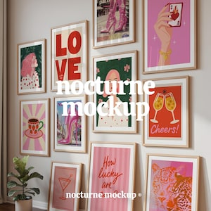 May include: A selection of framed art prints featuring diverse designs, such as a pink high heel, a hand holding a playing card, and the word "LOVE" in large red letters. The prints are displayed on a wall and leaning against it.