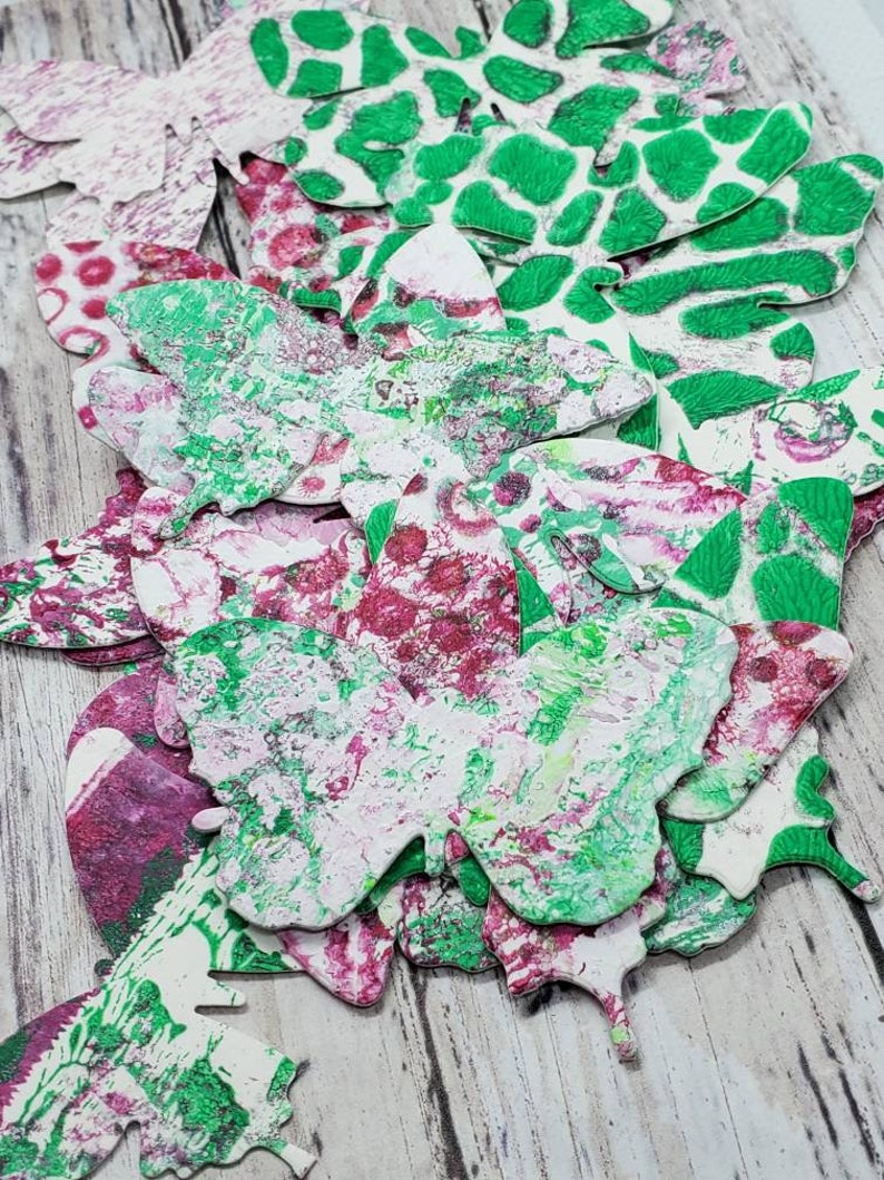 huge lot of random die cuts in fuschia and green