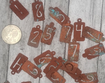 small faux rusted cardstock number tags