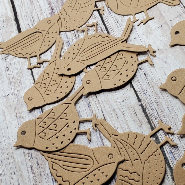 die cut birds in 4 different styles