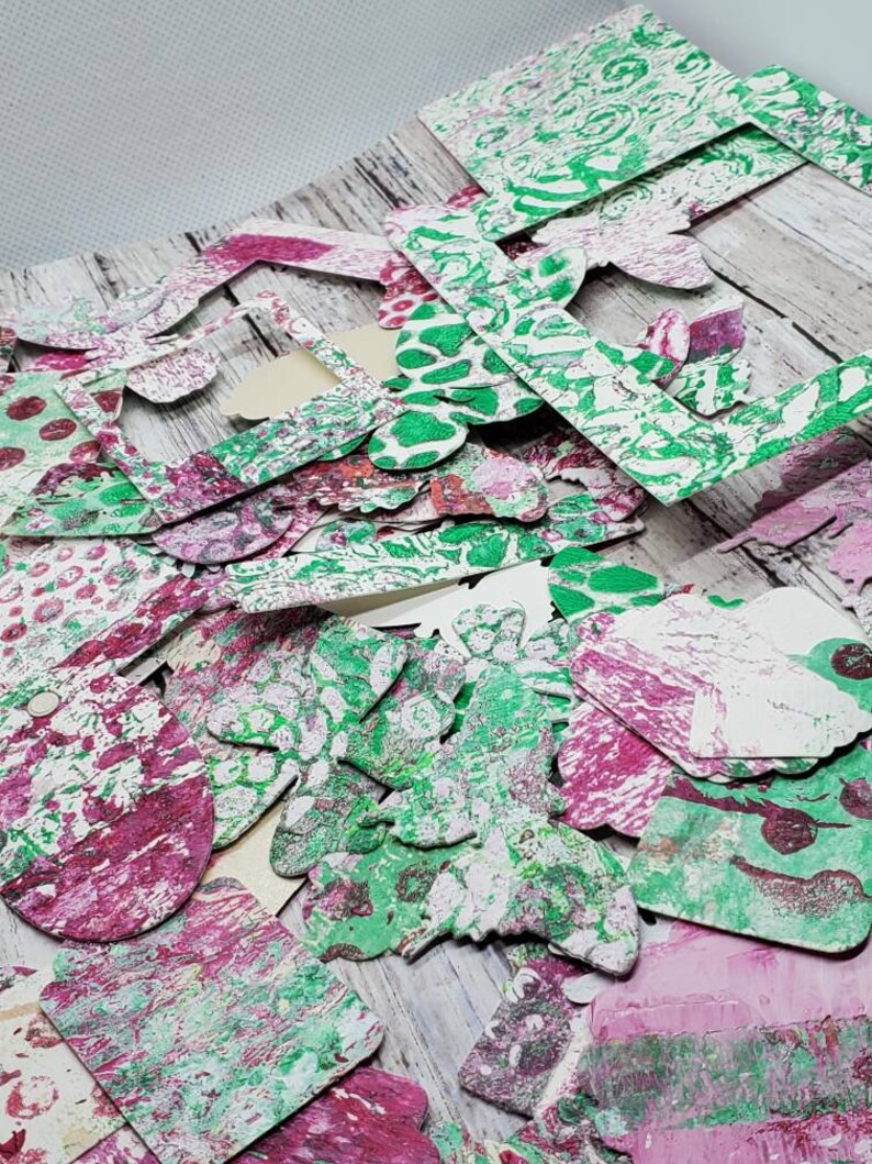 huge lot of random die cuts in fuschia and green
