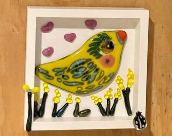 Whimsical fused glass bird in wood shadow box with flower accents