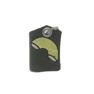 Macaroni &quot;Tag Bag&quot; medal protector and silencer
