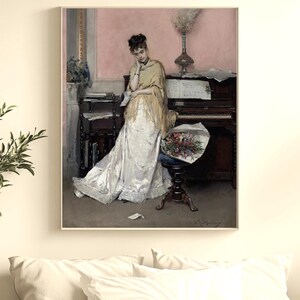 May include: A framed painting depicts a woman in a white gown and yellow shawl, leaning against a piano. A bouquet of flowers rests on a stool. The artwork is set in a room with a pink wall and a dark wooden piano.