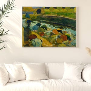 Puede incluir: Una pintura de un grupo de personas lavando ropa en un río. La pintura está realizada en un estilo que recuerda al impresionismo, con colores fuertes y pinceladas. Las personas visten ropa colorida y el río es de un azul vibrante.