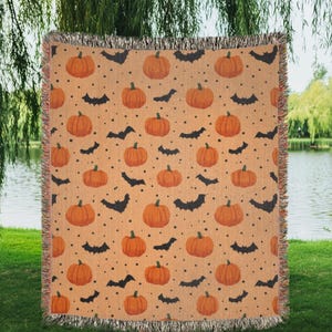 Couverture tissée chauve-souris citrouille d'Halloween pour une décoration d'automne confortable, parfaite pour le salon, la chambre à coucher ou les décorations d'Halloween saisonnières
