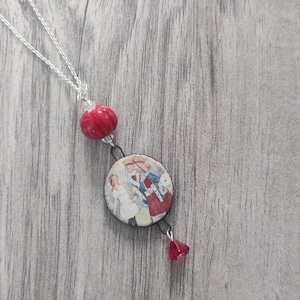 Collier tendance Alice au pays des merveilles