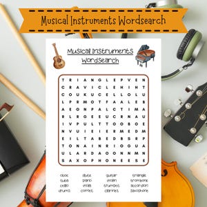 May include: A white sheet of paper with a musical instruments word search puzzle. The puzzle includes words like "piano", "violin", and "saxophone". A banner at the top reads "Musical Instruments Wordsearch". Musical instruments such as a guitar and headphones are in the background.