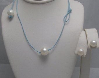 Solitaire Genuine white freshwater pearl necklace with pearl toggle clasp and earrings set on leather
