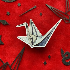 Paper crane sticker for Dramione fanfic reader, newspaper origami crane sticker
