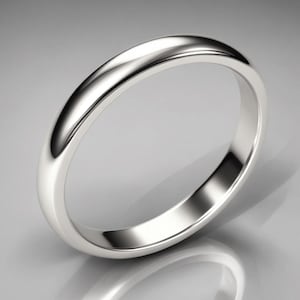 May include: A simple, polished silver wedding band.