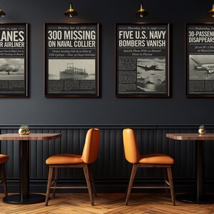 May include: Four framed newspaper clippings with black frames and white text on a dark gray wall. The clippings are about missing planes and ships. The clippings are titled "72 Planes Search for Airliner", "300 Missing on Naval Collier", "Five U.S. Navy Bombers Vanish", and "30-Passenger Plane Disappears in Flight".