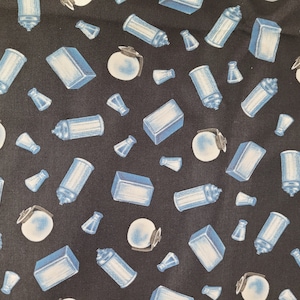 May include: A black fabric with a repeating pattern of blue and white illustrations of salt shakers, pepper shakers, and small jars.