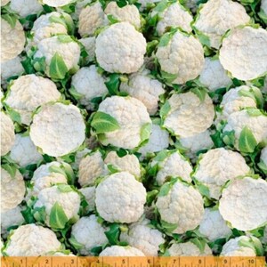 May include: A close-up image of a group of white caulifower heads with green leaves. The caulifower heads are arranged in a random pattern and are all in focus. The image is taken from a slightly elevated angle.