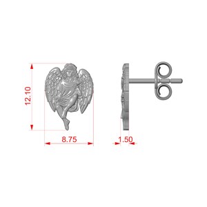 May include: A pair of silver-colored angel stud earrings. The angel is depicted in a seated position with detailed wings. The earrings measure 0.47 inches wide, 0.6 inches long, and 0.06 inches thick.