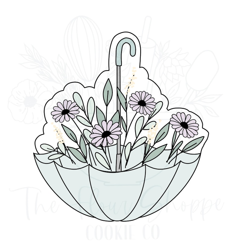 Puede incluir: Un cortador de galletas con forma de paraguas con flores en su interior. El paraguas es de color azul claro y las flores son de color morado y amarillo.