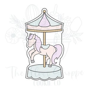 May include: A carousel horse cookie cutter with a pale pink horse, a light blue base, and a soft purple roof. The design features a central pole supporting the horse, with a scalloped edge at the bottom and a pointed top, outlined in a thick black line.