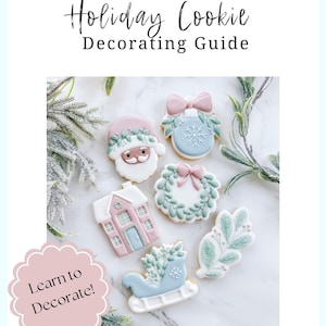 May include: A collection of six decorated sugar cookies with a winter holiday theme. The cookies are decorated with pastel pink, blue, and green icing. The cookies include a Santa Claus, a Christmas tree ornament, a wreath, a house, a sleigh, and a sprig of holly. The text "Learn to Decorate!" is on a pink circle in the lower left corner. The text "THE FLOUR SHOPPE COOKIE CO" is at the bottom of the image.