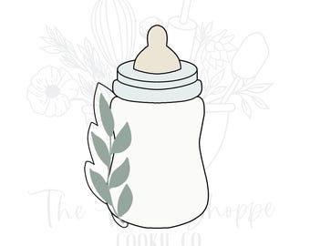 Cortador de galletas para baby shower con biberón y vegetación