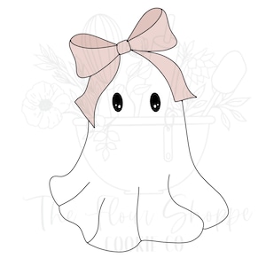 May include: A white ghost-shaped cookie cutter with a light pink bow on top. The ghost has two black eyes and a flowing bottom. The Flour Shoppe Cookie Co. logo is at the bottom.